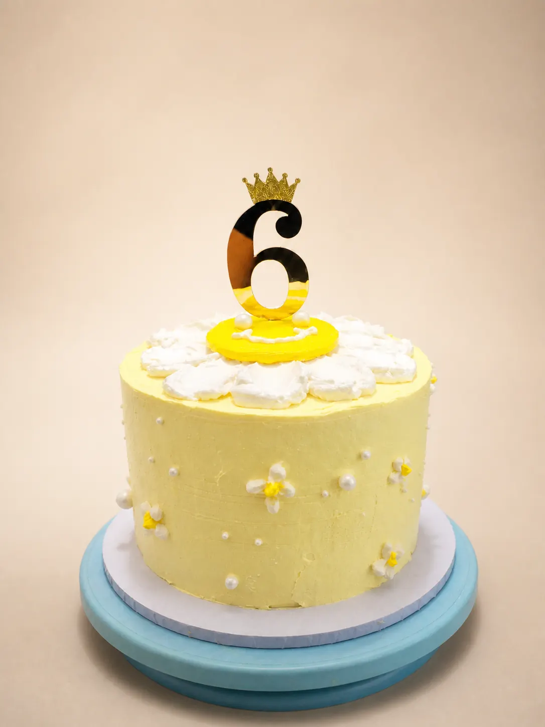 A cookies and cream cake with crushed biscuit through the buttercream